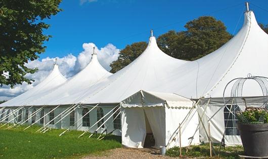 high-quality porta potties stationed at a wedding, meeting the needs of guests throughout the outdoor reception in Roberts